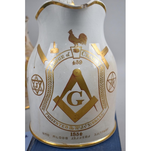 133 - A Collection of Four Mid 19th Century and Later Cream Glazed  Masonic Jugs From the Lodge of Charity... 