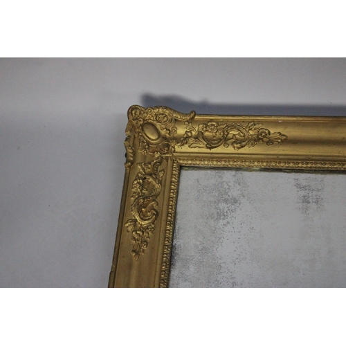 A Large Gilt Framed Mirror,163 x 95cms