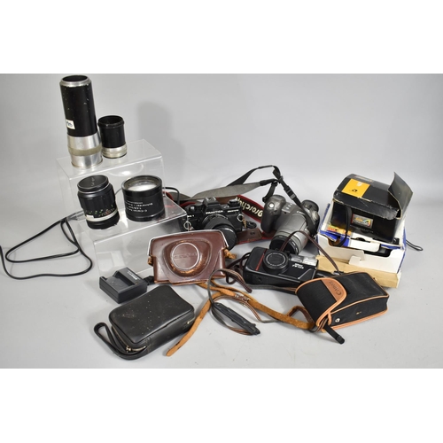 297 - A Collection of Various Cameras to Comprise Praktica, Canon etc Together with Various Lenses to Incl... 