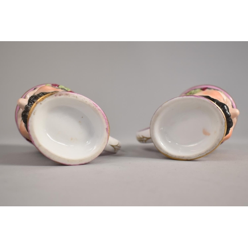 307 - A Pair of Porcelain Bacchanalian Mask Mugs, 10cm high