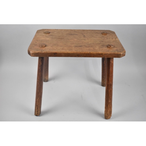 312 - An Oak Primitive Stool with Four Staked Supports and Canted Rectangular Top, 41.5x28.5x37.5cm high