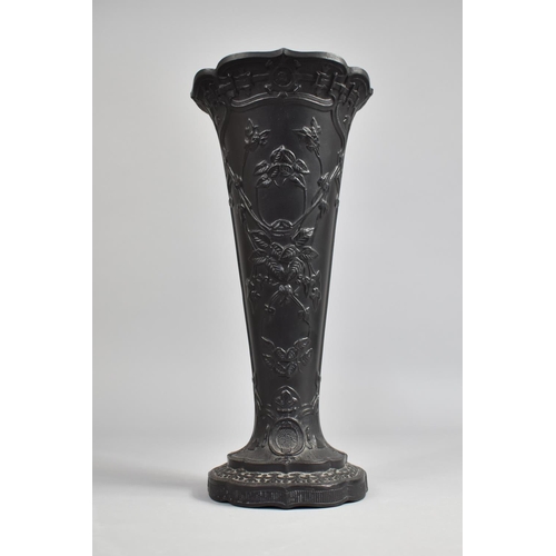 325 - A Tall Wedgwood Basalt Vase of Trumpet Form Decorated with Aesthetic Foliate Relief, 28.5cm high