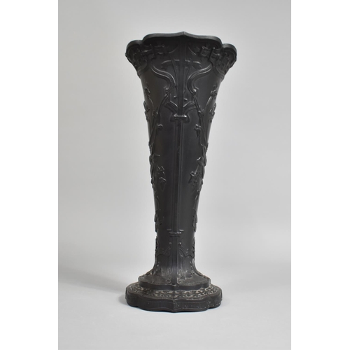 325 - A Tall Wedgwood Basalt Vase of Trumpet Form Decorated with Aesthetic Foliate Relief, 28.5cm high