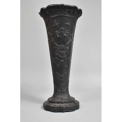 325 - A Tall Wedgwood Basalt Vase of Trumpet Form Decorated with Aesthetic Foliate Relief, 28.5cm high