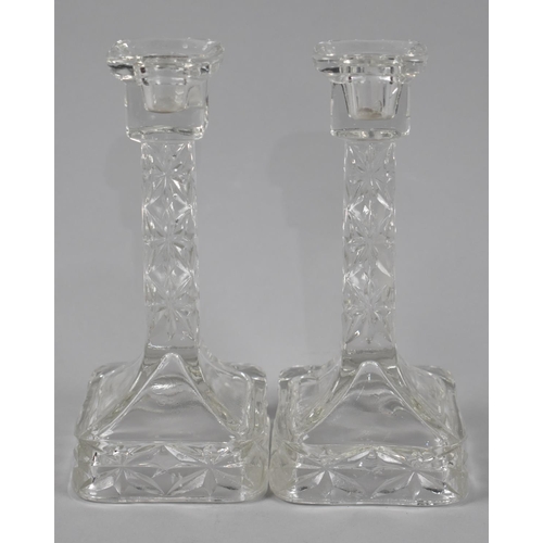 336 - A Pair of Moulded Glass Candle Sticks on Cube Bases, 18.5cm high