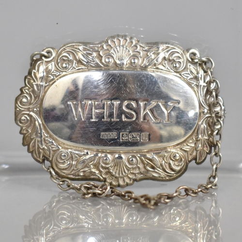 345 - A Silver Decanter Label for Whisky by CR&S, Birmingham 1994