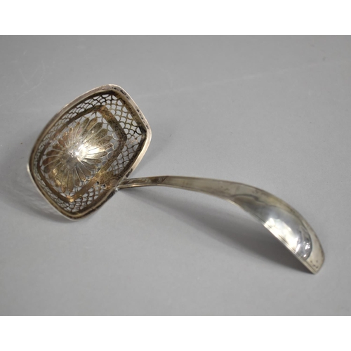 352 - A Continental Silver Sifter Spoon with Pierced Bowl Incorporating Flower Head Motif, 15cm wide