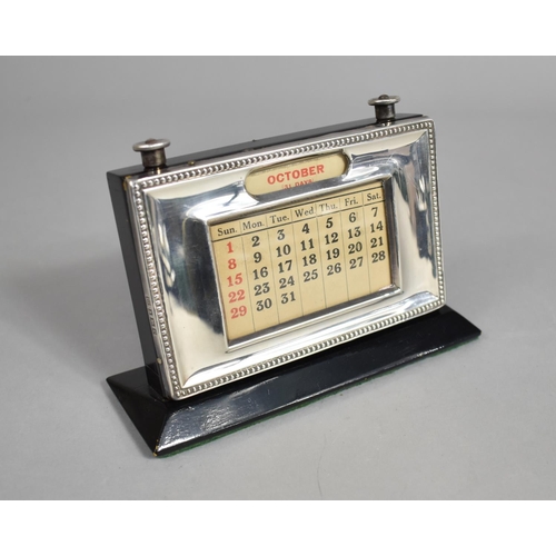 355 - A Silver Mounted Desktop Calendar by W J Myatt & Co, Birmingham Hallmark 1952, 15x10cm high