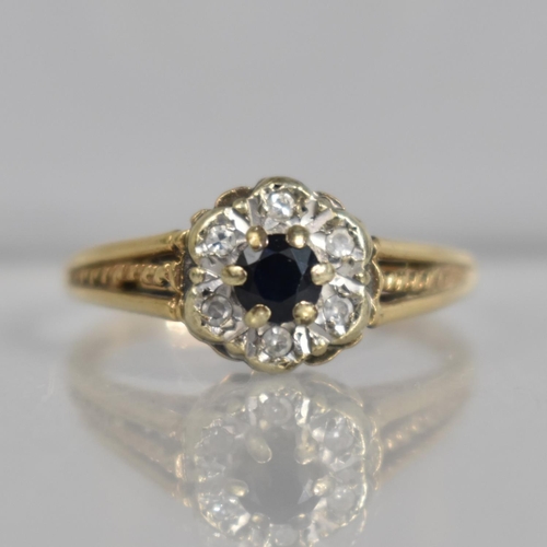 363 - A 9ct Gold Sapphire and Diamond Cluster Ring, 2.6g, Size Q