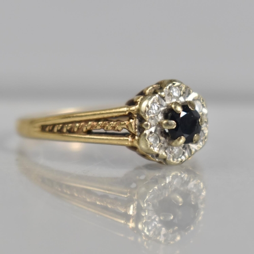 363 - A 9ct Gold Sapphire and Diamond Cluster Ring, 2.6g, Size Q