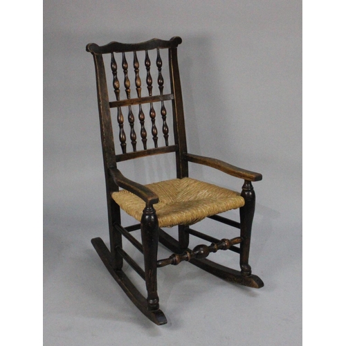 407 - A 19th Century Spindle Back Rush Seated Rocking Chair