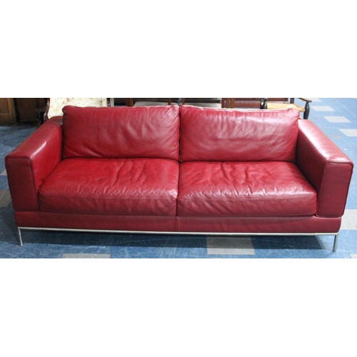 409 - A Vintage Leather Upholstered Three Seater Settee, 200cm wide