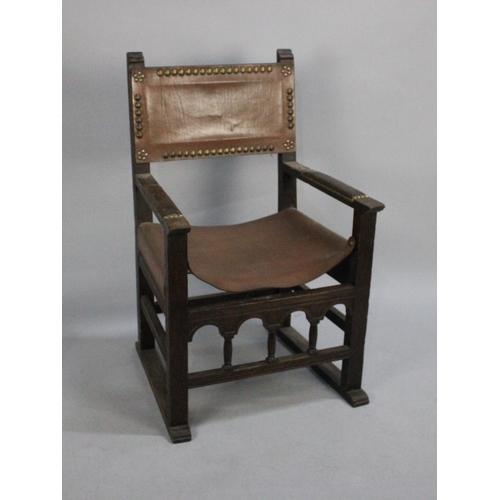 411 - An Edwardian Oak Framed Armada Style Chair with Brass Studded Leather Arms and Back