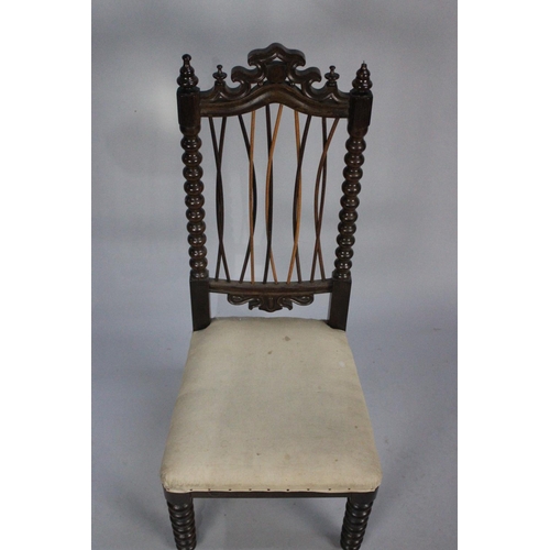 414 - A Victorian Rosewood Framed Nursing Chair with Bobbin Front Legs and Back Supports