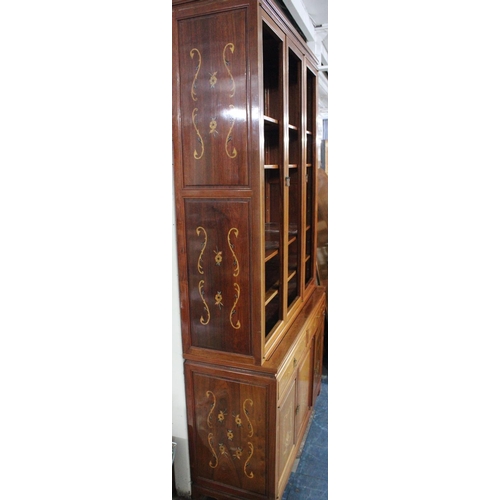 423 - A Large Continental Inlaid Bookcase with Six Inner Shelves to Unglazed Top Section, Base Section wit... 