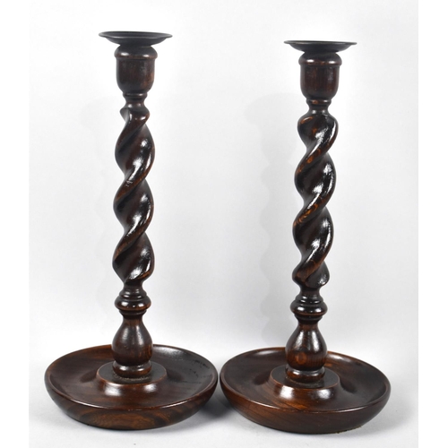 43 - A Pair of Edwardian Oak Barley Twist Candlesticks, 30cm High