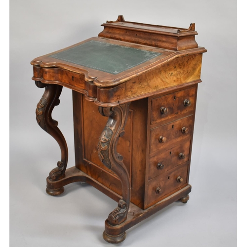 84 - A Late 19th Century Burr Walnut Davenport with Hinged Slope having Tooled Leather Writing Surface to... 