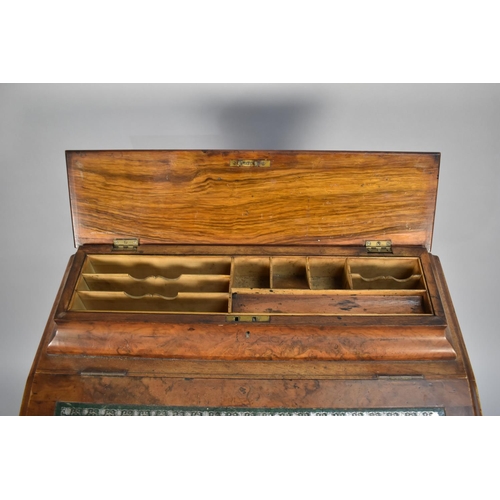 84 - A Late 19th Century Burr Walnut Davenport with Hinged Slope having Tooled Leather Writing Surface to... 