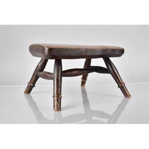 23 - A Small 19th Century Rustic Rectangular Elm Topped Stool with Splayed Turned Supports, 25x17x15.5cm ... 