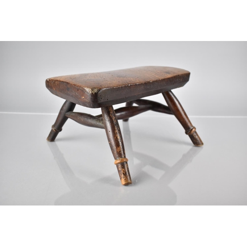 23 - A Small 19th Century Rustic Rectangular Elm Topped Stool with Splayed Turned Supports, 25x17x15.5cm ... 