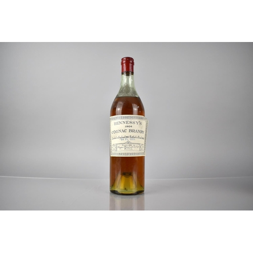 56 - A Single Bottle of 1904 Hennessey's Cognac Brandy, 'Landed in England 1905. Bottled in Bond 1942'