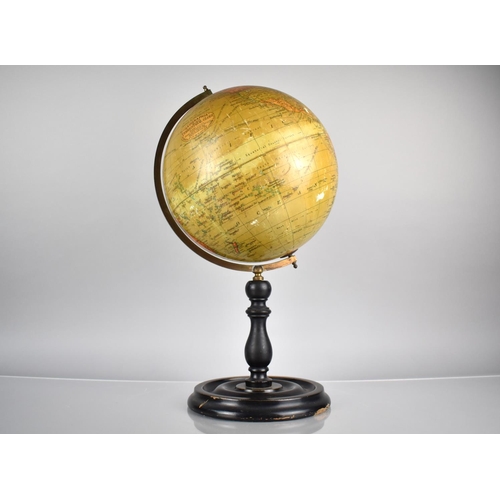 55 - An Early 20th Century 'Geographia' 10 inch Terrestrial Globe on Turned Wooden Ebonised Stand, 46cm H... 