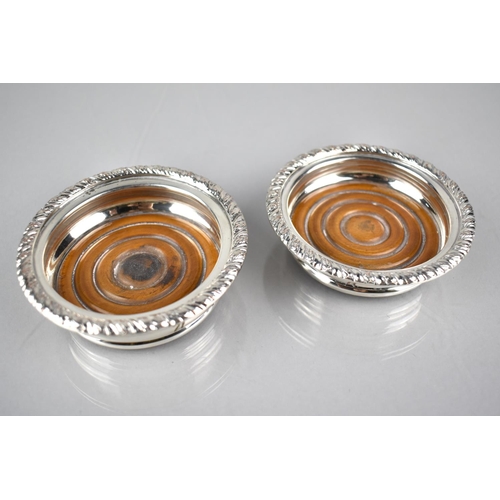 117 - A Pair of 19th/20th Century Silver Plated Coasters with Turned Wooden Bases, Reeded Trim and Stag Cr... 