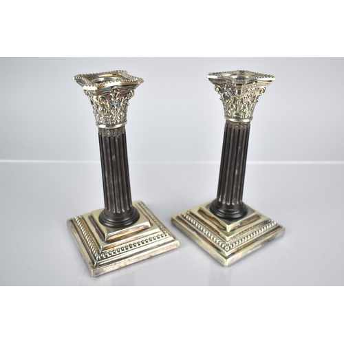 121 - A Pair of Small Silver Plate and Wooden Candlesticks in the Form of Ribbed Corinthian Columns By RH ... 