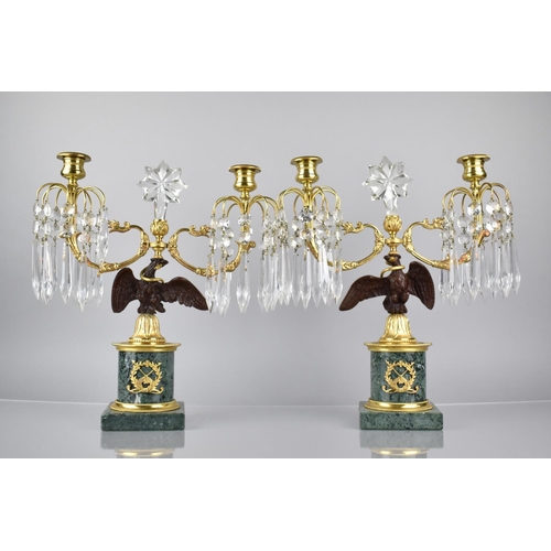 96 - A Pair of french Gilt Metal, Bronze and Marble Two Branch Candelabra Garnitures, the Supports in the... 