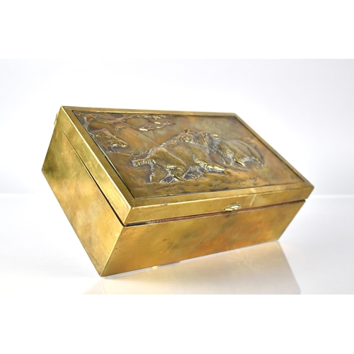 92 - A Continental Brass Box, The Hinged Lid Decorated in Relief with Two Wild Boar Fighting, 21.5x13x7.5... 