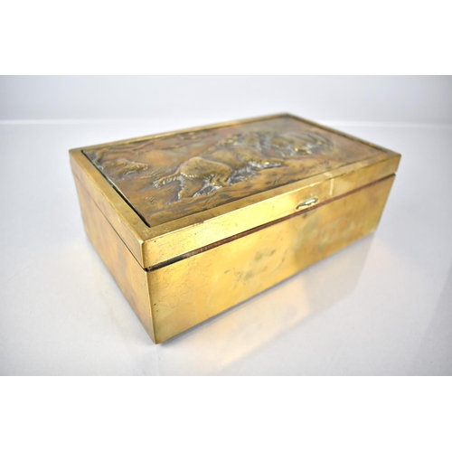 92 - A Continental Brass Box, The Hinged Lid Decorated in Relief with Two Wild Boar Fighting, 21.5x13x7.5... 