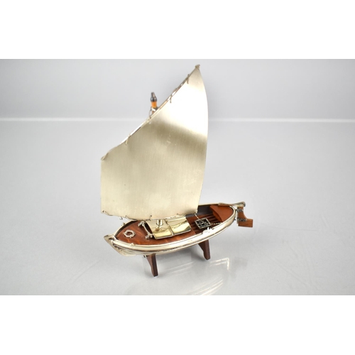 173 - A Silver and Teak Study of a Yacht, Stamped 925, 11cms Wide and 13cms High