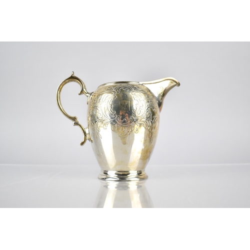 147 - A Victorian Silver and Parcel Gilt Jug by WH, London Hallmark 1843 with Scrolled Handle and Engraved... 