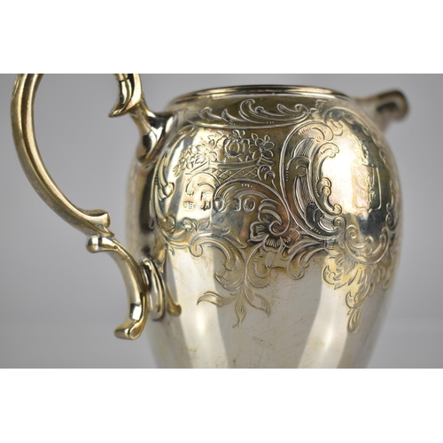 147 - A Victorian Silver and Parcel Gilt Jug by WH, London Hallmark 1843 with Scrolled Handle and Engraved... 