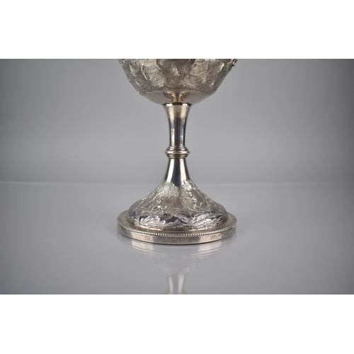 164 - An Indian Silver Goblet by Cooke and Kelvey, Calcutta (1858-1930) Finely decorated with Repousse, En... 