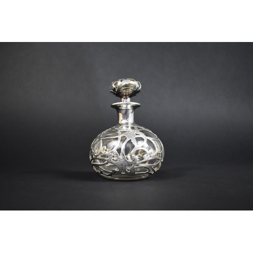 180 - A Silver Overlaid Glass Perfume Bottle Decorated in a Floral Motif, 12cm High, Stamped Sterling Silv... 