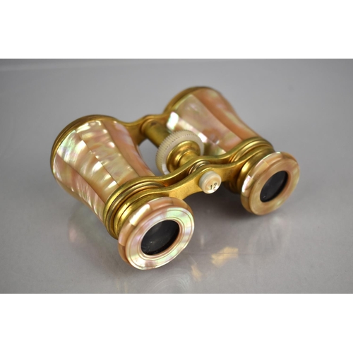 207 - A Pair of Cased Late 19th Century Mother of Pearl Mounted Opera Glasses