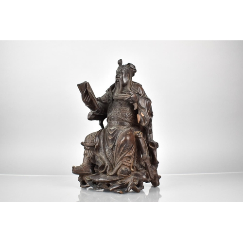 322 - A Late 19th Century Chinese Root Carved Figure of Seated Warrior Reading Book. Some Losses and Chips... 