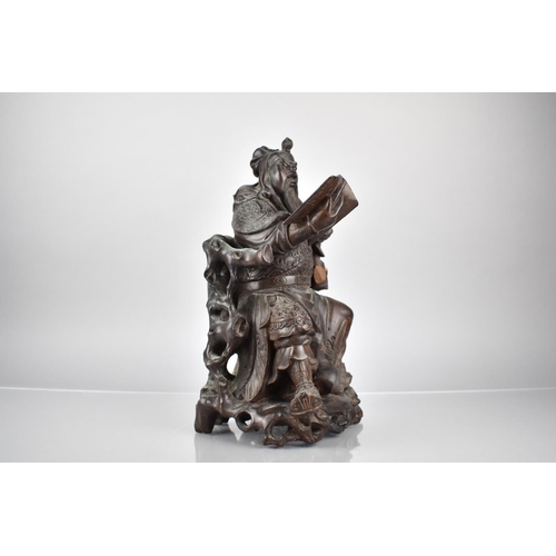 322 - A Late 19th Century Chinese Root Carved Figure of Seated Warrior Reading Book. Some Losses and Chips... 