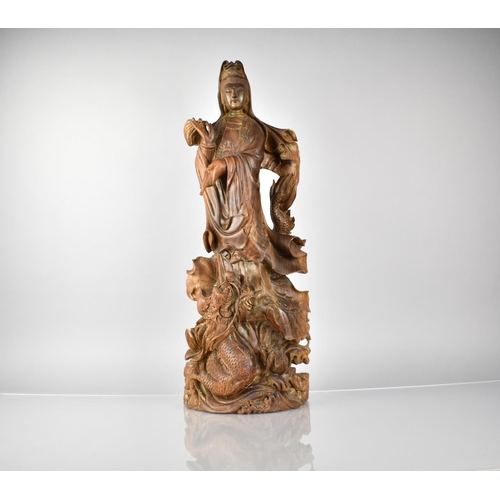 320 - A Large and Heavy Chinese Root Carving of Guanyin with Dragon at Her Feet, Good Detail, 59cm High