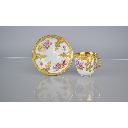 378 - A KPM Porcelain Cup and Saucer Decorated with Hand Painted Flowers and Enriched with Gilt Floral Scr... 