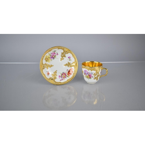 378 - A KPM Porcelain Cup and Saucer Decorated with Hand Painted Flowers and Enriched with Gilt Floral Scr... 