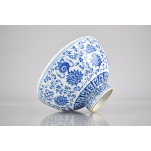 304 - A Chinese Porcelain Blue & White Footed Bowl Decorated in the Ming Style with Continuing Scrolls and... 