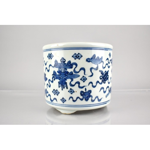 303 - A Chinese Porcelain Blue and White Planter on Short Tripod Supports Decorated with Precious Objects,... 