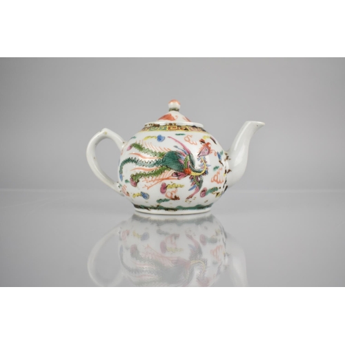 271 - A Chinese Porcelain Teapot in Polychrome Enamels Detailing Red Dragon and Phoenix Amongst Scrolls, 9... 