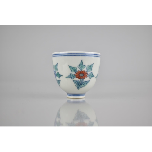 269 - A Small Ming Style Chinese Doucai Cup Decorated with Flowers, Four Character Mark to Base, 5cm High