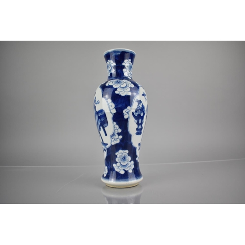 285 - A 19th Century Qing Period Porcelain Blue and White Prunus Pattern Baluster Vase with Precious Objec... 