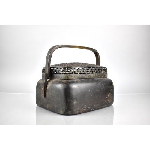 355 - A Large Qing Dynasty Chinese Bronze Warmer with Swing Handle to Rectangular Shouldered Base, The Pie... 