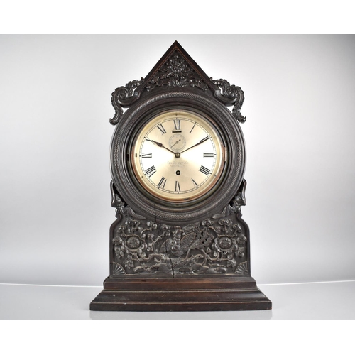 325 - A Large Late 19th Century Chinese Hardwood Clock of Architectural Form and Decorated in Carved Relie... 