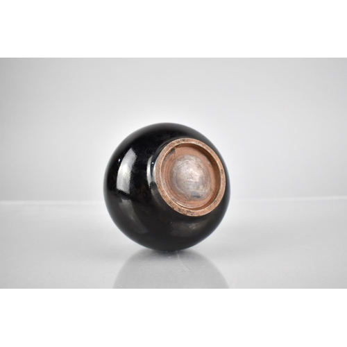 228 - A Chinese Black Glazed Pot of Globular Form, 8cm High